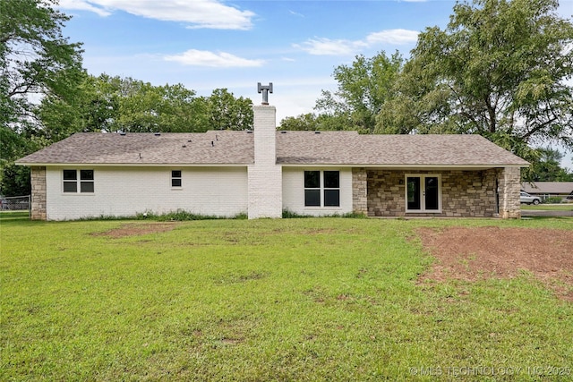 10062 E Northshire St, Claremore, OK 74017 - rear view of property featuring a chimney, a lawn, french doors, stone siding, and a shingled roof