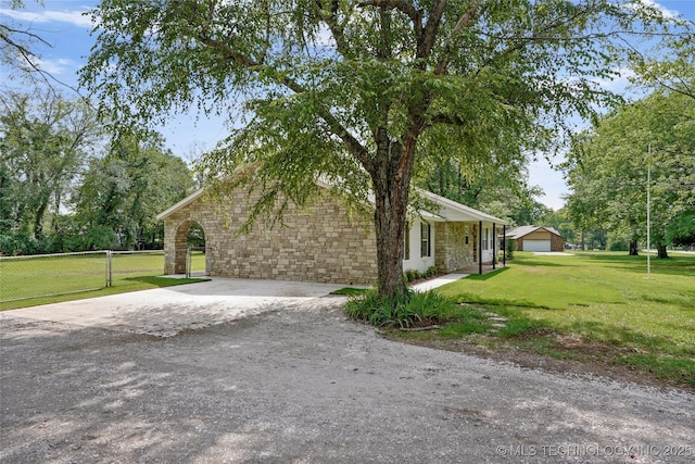 10062 E Northshire St, Claremore, OK 74017 - view of side of home with stone siding
