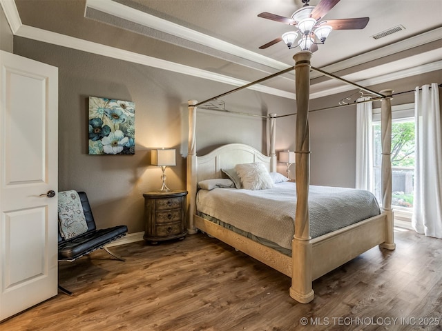 9025 N 100th E Ave, Owasso, OK 74055 - bedroom featuring crown molding, wood finished floors, and ceiling fan