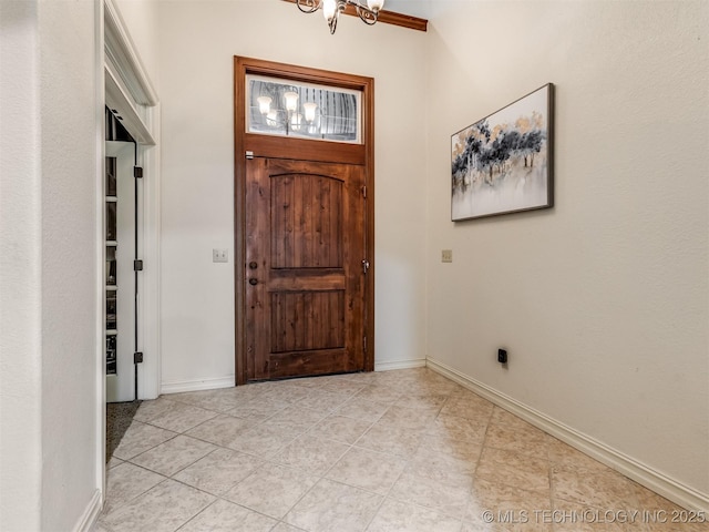 9025 N 100th E Ave, Owasso, OK 74055 - entryway with a chandelier and light tile patterned floors