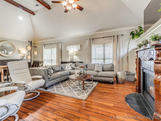 9025 N 100th E Ave, Owasso, OK 74055 - living room with a ceiling fan, beam ceiling, high vaulted ceiling, and hardwood / wood-style floors