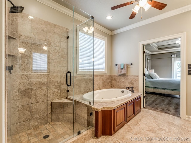 9025 N 100th E Ave, Owasso, OK 74055 - full bath with connected bathroom, ornamental molding, a jetted tub, a stall shower, and a ceiling fan