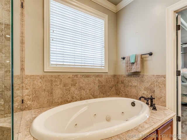 9025 N 100th E Ave, Owasso, OK 74055 - bathroom with a tub with jets and ornamental molding