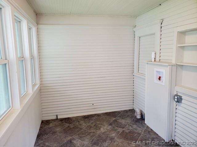1319 Bixby St, Ardmore, OK 73401 - laundry area with hookup for a washing machine and dark stone finish flooring