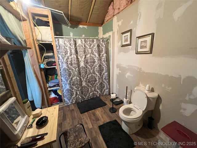 183006 N 4170th Rd, Moyers, OK 74557 - bathroom featuring wood finished floors and a shower with shower curtain