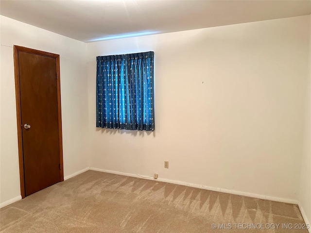705 W 3rd St, Skiatook, OK 74070 - unfurnished room featuring carpet
