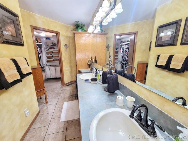 17978 W Stone Chapel Rd, Tahlequah, OK 74464 - full bathroom with a walk in closet, tile patterned flooring, and double vanity