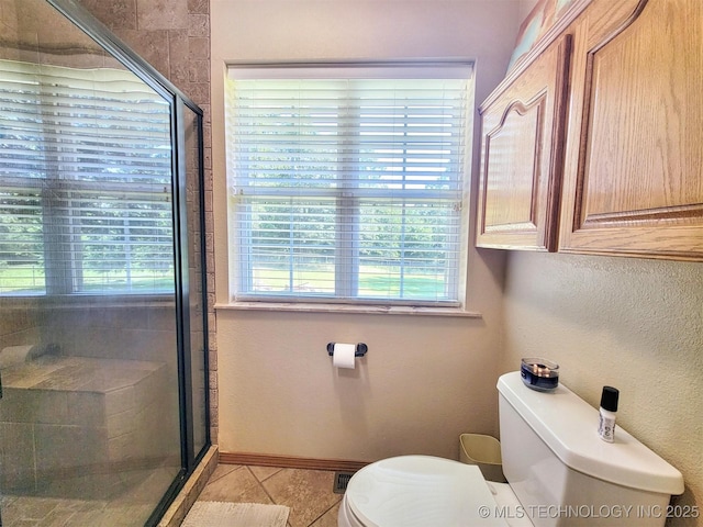 17978 W Stone Chapel Rd, Tahlequah, OK 74464 - bathroom with a shower stall, tile patterned floors, and a textured wall