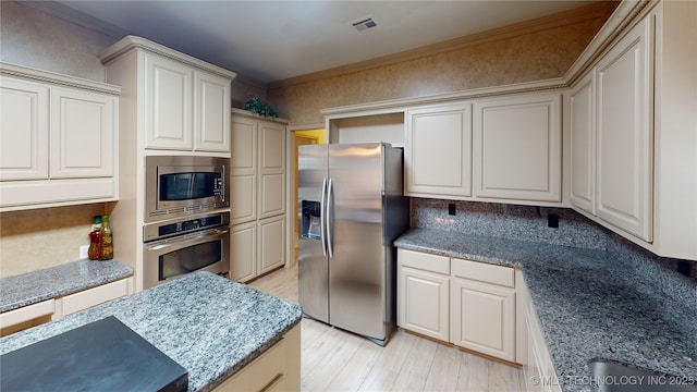3302 Callaway Dr, Claremore, OK 74019 - kitchen with appliances with stainless steel finishes, light wood-type flooring, backsplash, crown molding, and light stone countertops
