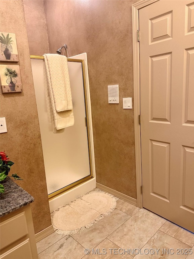3302 Callaway Dr, Claremore, OK 74019 - full bathroom with a stall shower, vanity, and tile patterned floors
