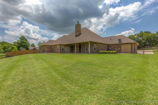 3302 Callaway Dr, Claremore, OK 74019 - rear view of property with brick siding and a chimney