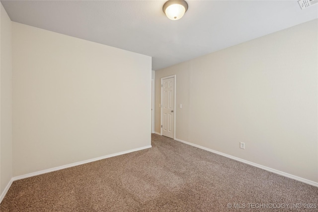 1701 W Durham St, Broken Arrow, OK 74011 - carpeted spare room with baseboards