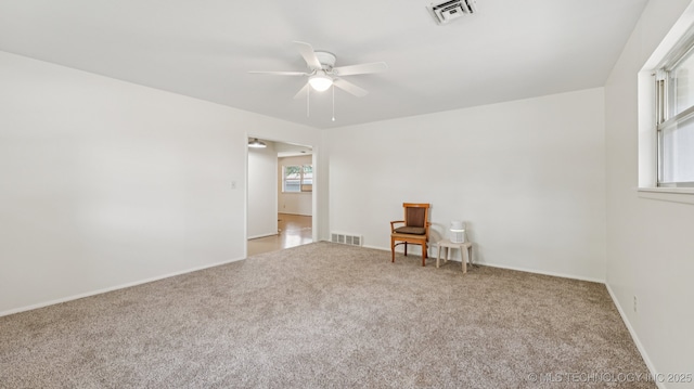 4944 Cornell Dr, Bartlesville, OK 74006 - spare room with carpet floors and ceiling fan