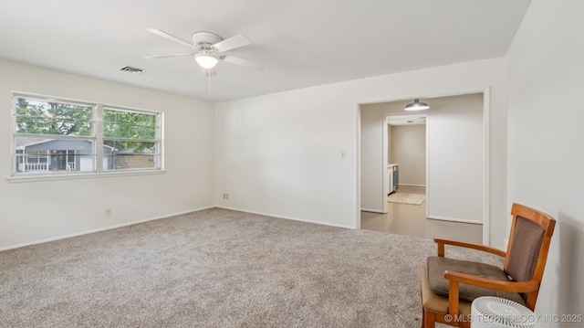4944 Cornell Dr, Bartlesville, OK 74006 - carpeted empty room featuring ceiling fan and baseboards