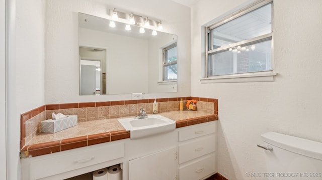 4944 Cornell Dr, Bartlesville, OK 74006 - bathroom with toilet and vanity