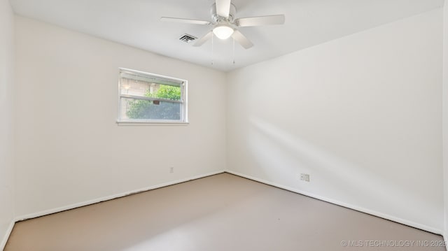 4944 Cornell Dr, Bartlesville, OK 74006 - spare room featuring ceiling fan and baseboards