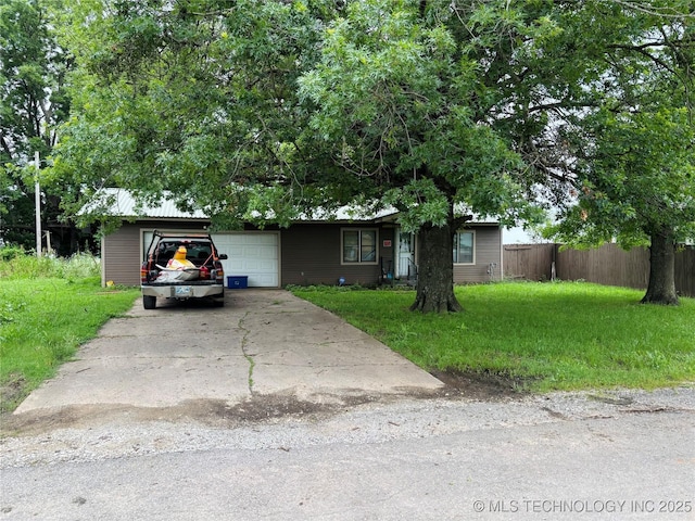 1503 Hillcrest, Durant, OK 74701 - view of front facade with a garage and driveway