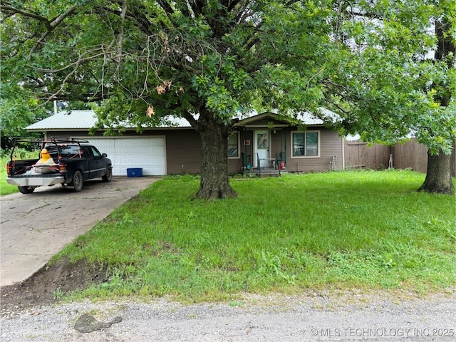 1503 Hillcrest, Durant, OK 74701 - view of front of house featuring an attached garage and driveway