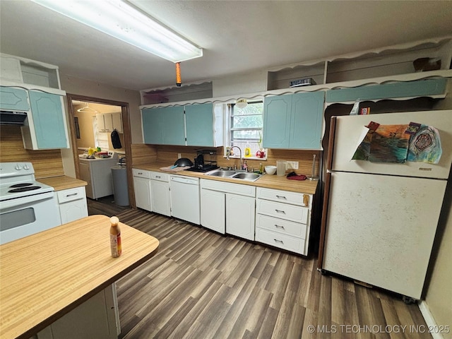 1503 Hillcrest, Durant, OK 74701 - kitchen featuring white appliances, extractor fan, dark wood-type flooring, and wooden counters