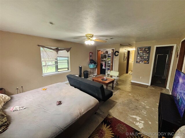 1503 Hillcrest, Durant, OK 74701 - bedroom with ceiling fan and baseboards