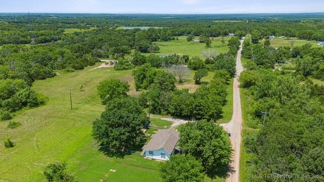 525 S 3rd Ave, Hallett, OK 74034 - aerial view of sparsely populated area with a heavily wooded area
