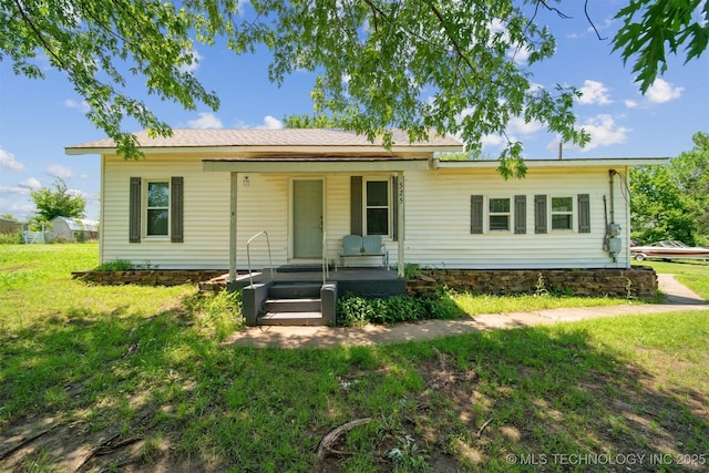 525 S 3rd Ave, Hallett, OK 74034 - ranch-style house featuring a porch and a front lawn