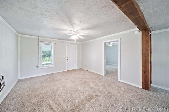 525 S 3rd Ave, Hallett, OK 74034 - unfurnished living room with a ceiling fan, carpet, a textured ceiling, and crown molding