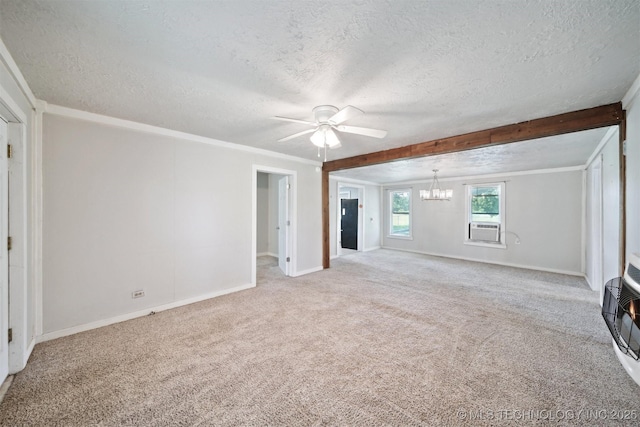 525 S 3rd Ave, Hallett, OK 74034 - unfurnished living room featuring a chandelier, a textured ceiling, ceiling fan, carpet floors, and ornamental molding