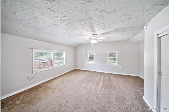 525 S 3rd Ave, Hallett, OK 74034 - carpeted empty room featuring lofted ceiling, a ceiling fan, cooling unit, and a smoke detector