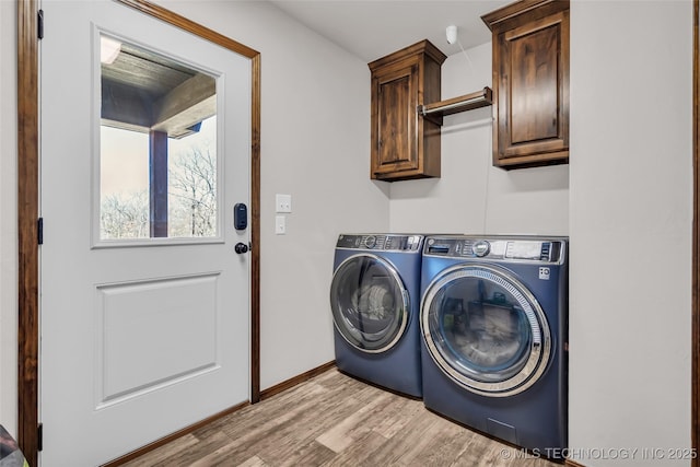 6335 S Watson, Sulphur, OK 73086 - laundry area with independent washer and dryer, cabinet space, and light wood-style floors