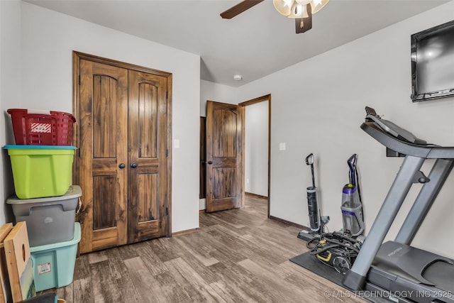 6335 S Watson, Sulphur, OK 73086 - workout room with a ceiling fan and wood finished floors