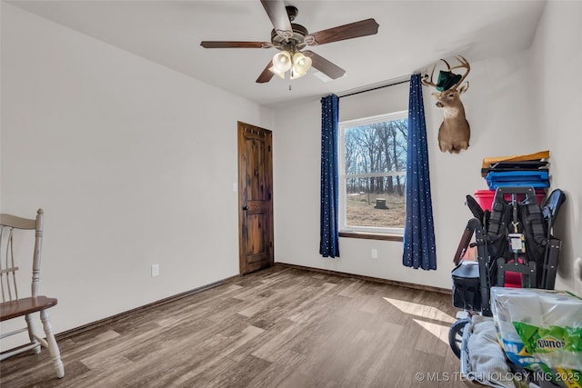 6335 S Watson, Sulphur, OK 73086 - unfurnished room featuring wood finished floors and a ceiling fan