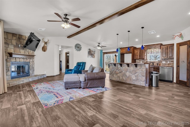 6335 S Watson, Sulphur, OK 73086 - living room with ceiling fan, wood finished floors, a fireplace, and recessed lighting