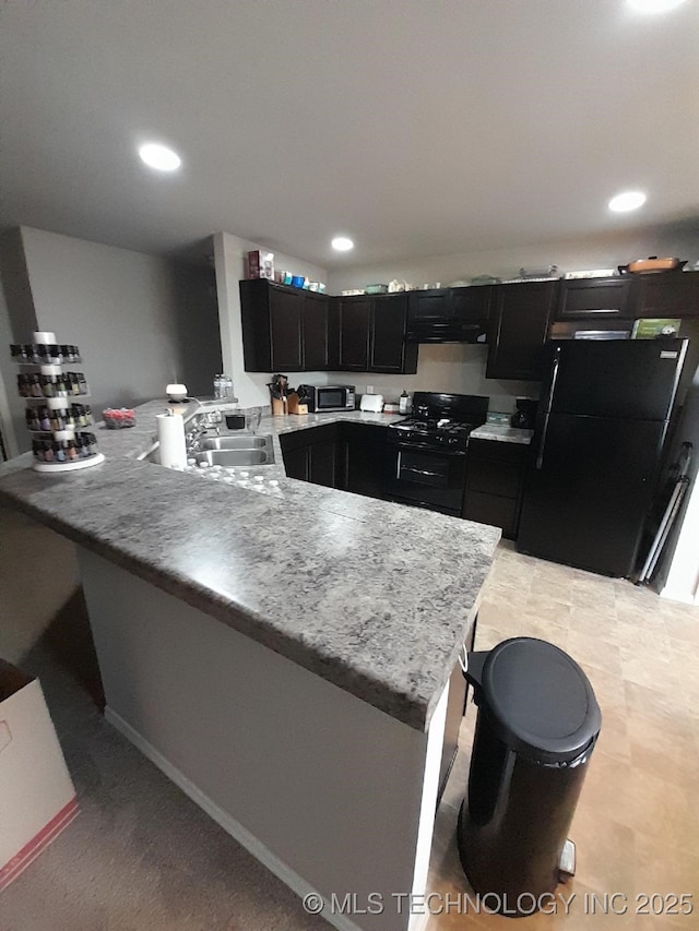 14652 S 276th E Ave, Coweta, OK 74429 - kitchen featuring black appliances, dark cabinetry, a peninsula, extractor fan, and recessed lighting