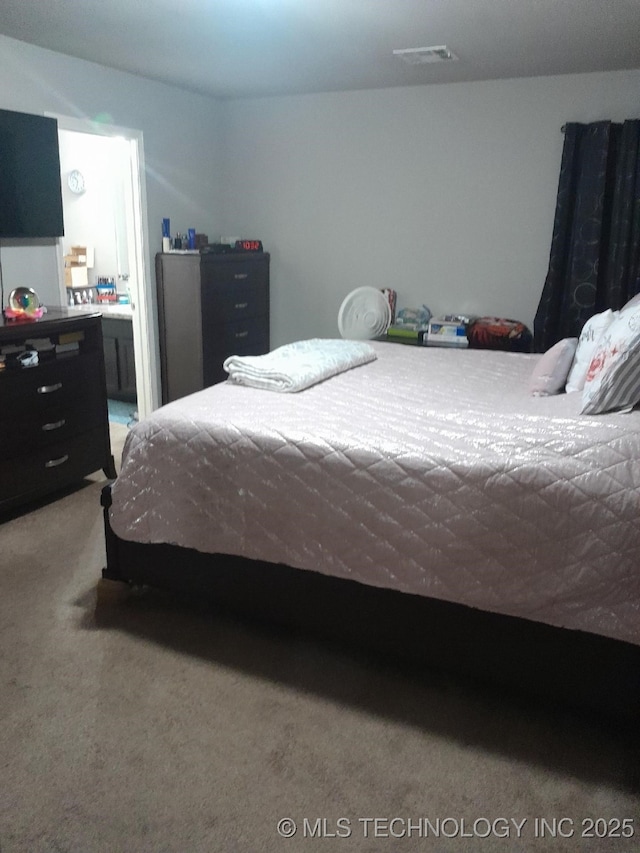 14652 S 276th E Ave, Coweta, OK 74429 - bedroom with light colored carpet and ensuite bath