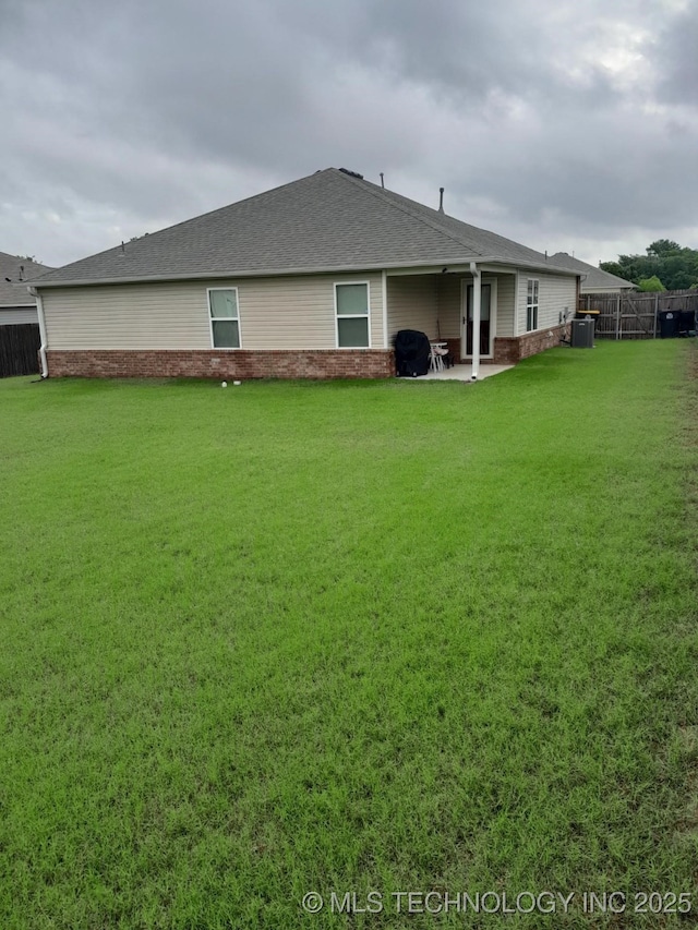 14652 S 276th E Ave, Coweta, OK 74429 - back of house with a patio and roof with shingles