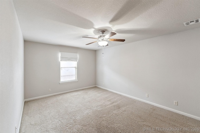 113 E 128th St S, Jenks, OK 74037 - carpeted empty room with a ceiling fan and a textured ceiling