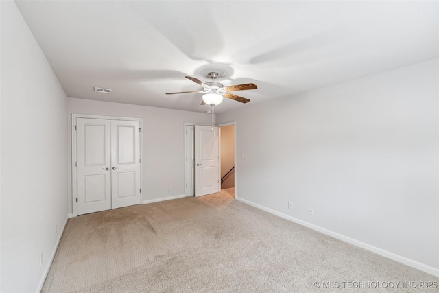 113 E 128th St S, Jenks, OK 74037 - unfurnished bedroom with light carpet, a closet, and ceiling fan
