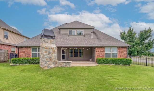 113 E 128th St S, Jenks, OK 74037 - back of property with a fenced backyard, a patio area, roof with shingles, and brick siding