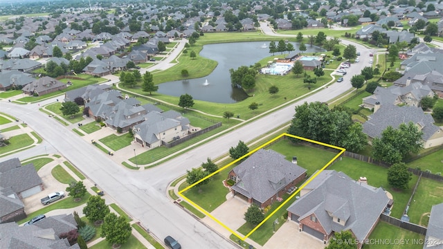113 E 128th St S, Jenks, OK 74037 - aerial view of residential area with a nearby body of water and property boundaries highlighted