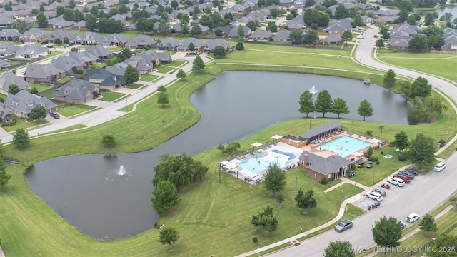 113 E 128th St S, Jenks, OK 74037 - aerial view of property and surrounding area with a large body of water and nearby suburban area
