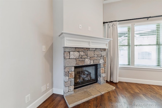 113 E 128th St S, Jenks, OK 74037 - detailed view of a stone fireplace and wood finished floors