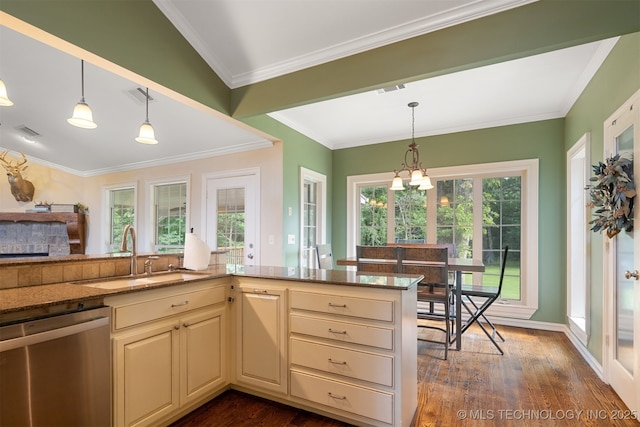 209 Shell Ln, Durant, OK 74701 - kitchen with dishwasher, stone countertops, dark wood-style flooring, and crown molding