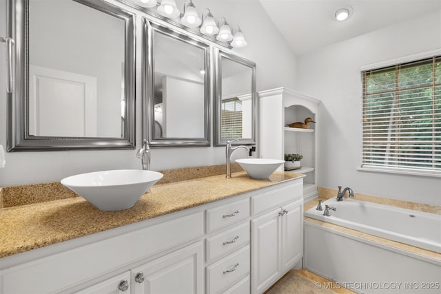 209 Shell Ln, Durant, OK 74701 - full bath with double vanity and a bath