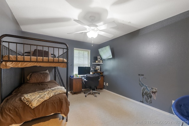 209 Shell Ln, Durant, OK 74701 - bedroom featuring an office area, carpet, and a ceiling fan