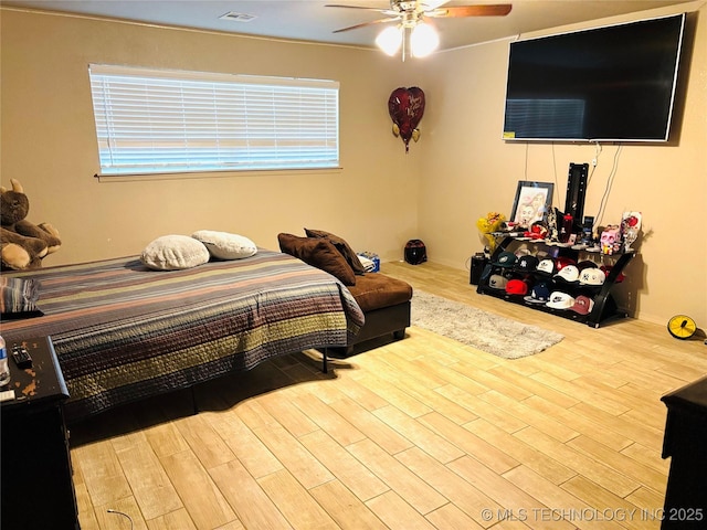 7936 S 72nd E Ave, Tulsa, OK 74133 - bedroom with wood finished floors and ceiling fan