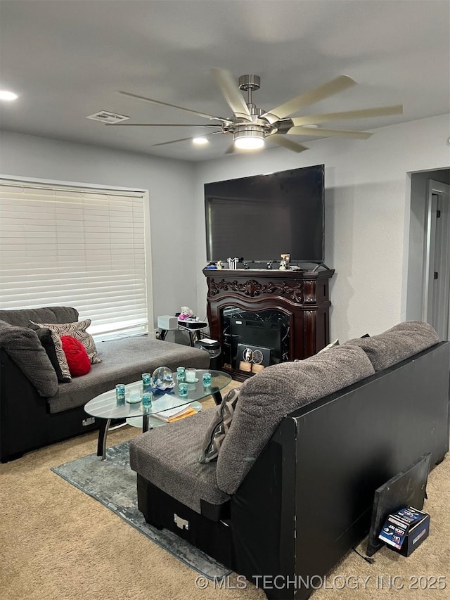 329 E Zion Pl, Tulsa, OK 74106 - carpeted living area featuring ceiling fan