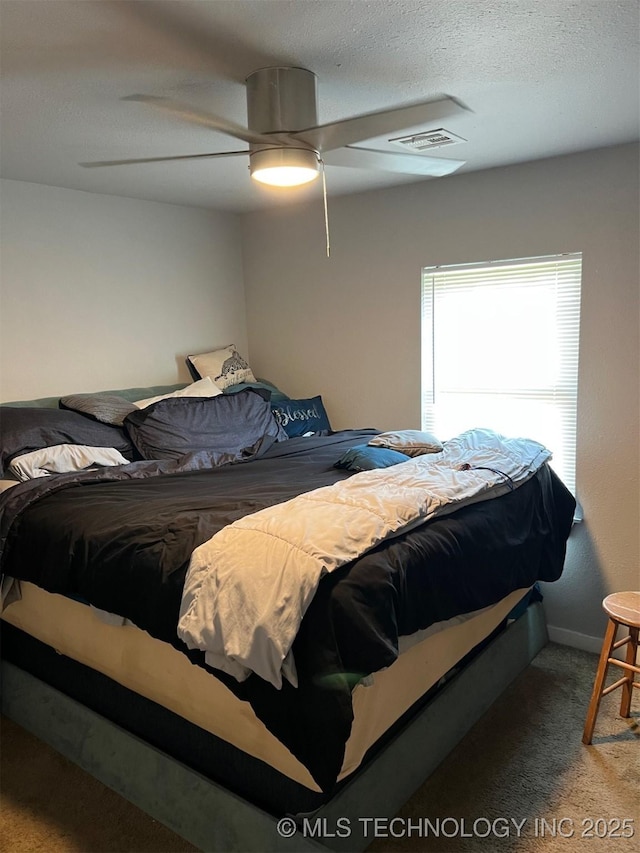 329 E Zion Pl, Tulsa, OK 74106 - carpeted bedroom featuring a ceiling fan and baseboards