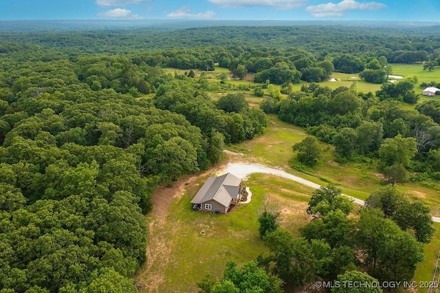 23997 County Road 1475th Loop, Ada, OK 74820 - bird's eye view of a heavily wooded area
