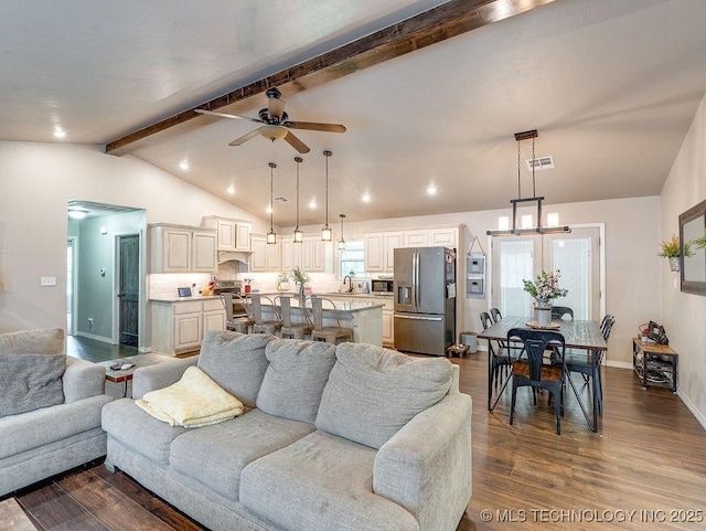 23997 County Road 1475th Loop, Ada, OK 74820 - living area with dark wood finished floors and ceiling fan